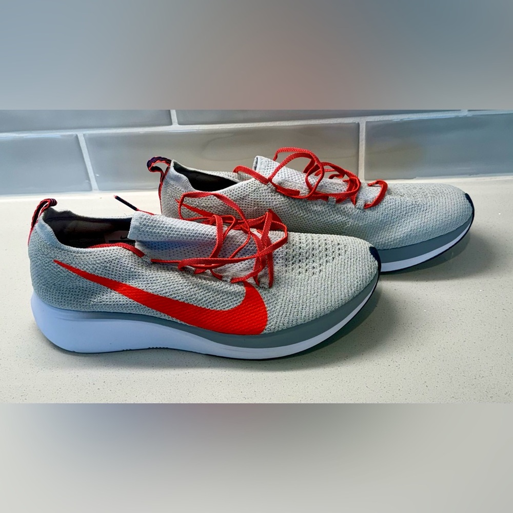 Nike Light Gray and orange running sneakers. Men’s 10. Never worn!